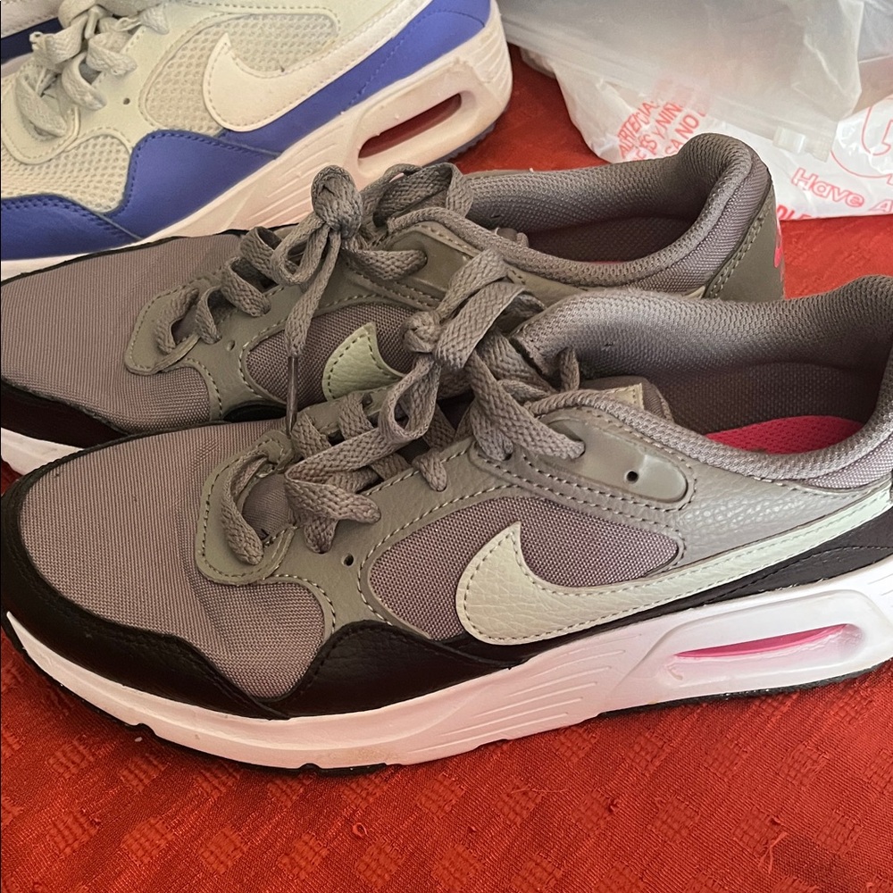 Nike Gray and Black Athletic Shoes with White Swoosh